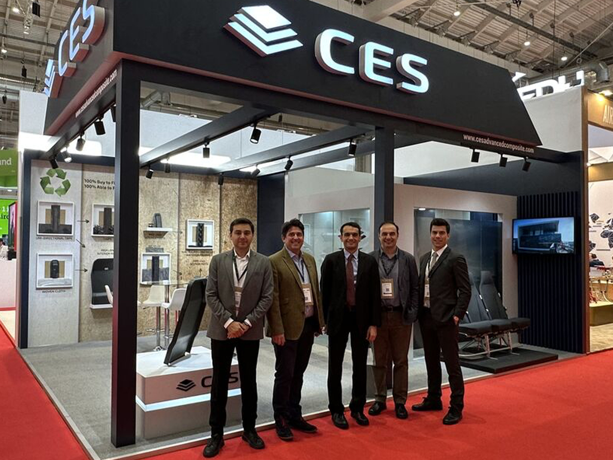 The team at the CES stand at AIX 2025
